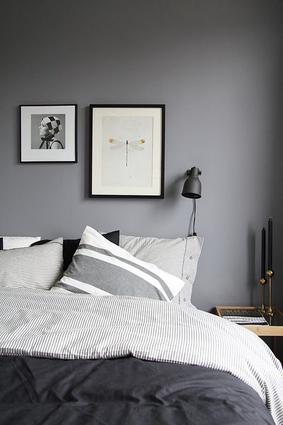 The mix of light grey stripe with solid dark grey bedding