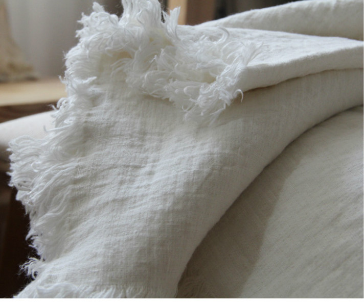 white blanket natural linen