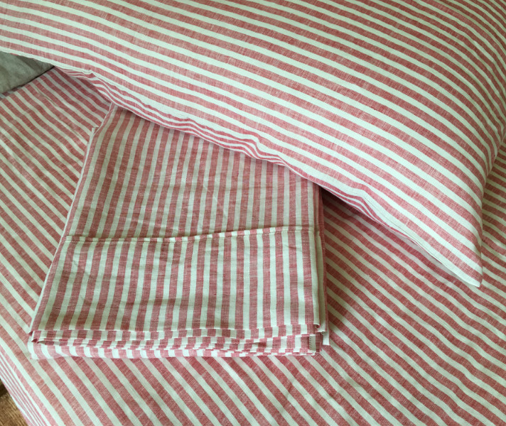 red and white striped bed sheets